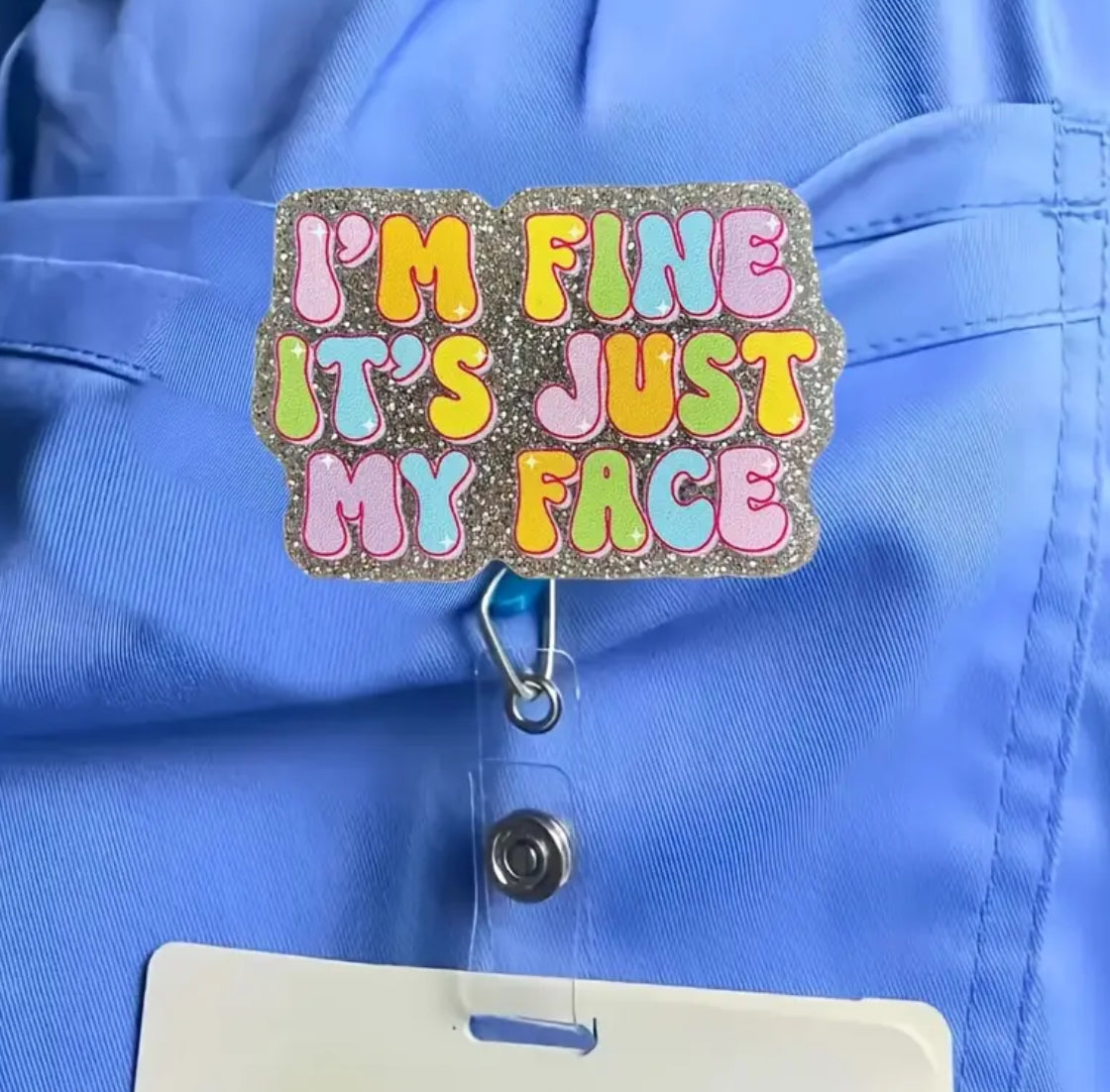 I’m fine it’s just my face Badge reel