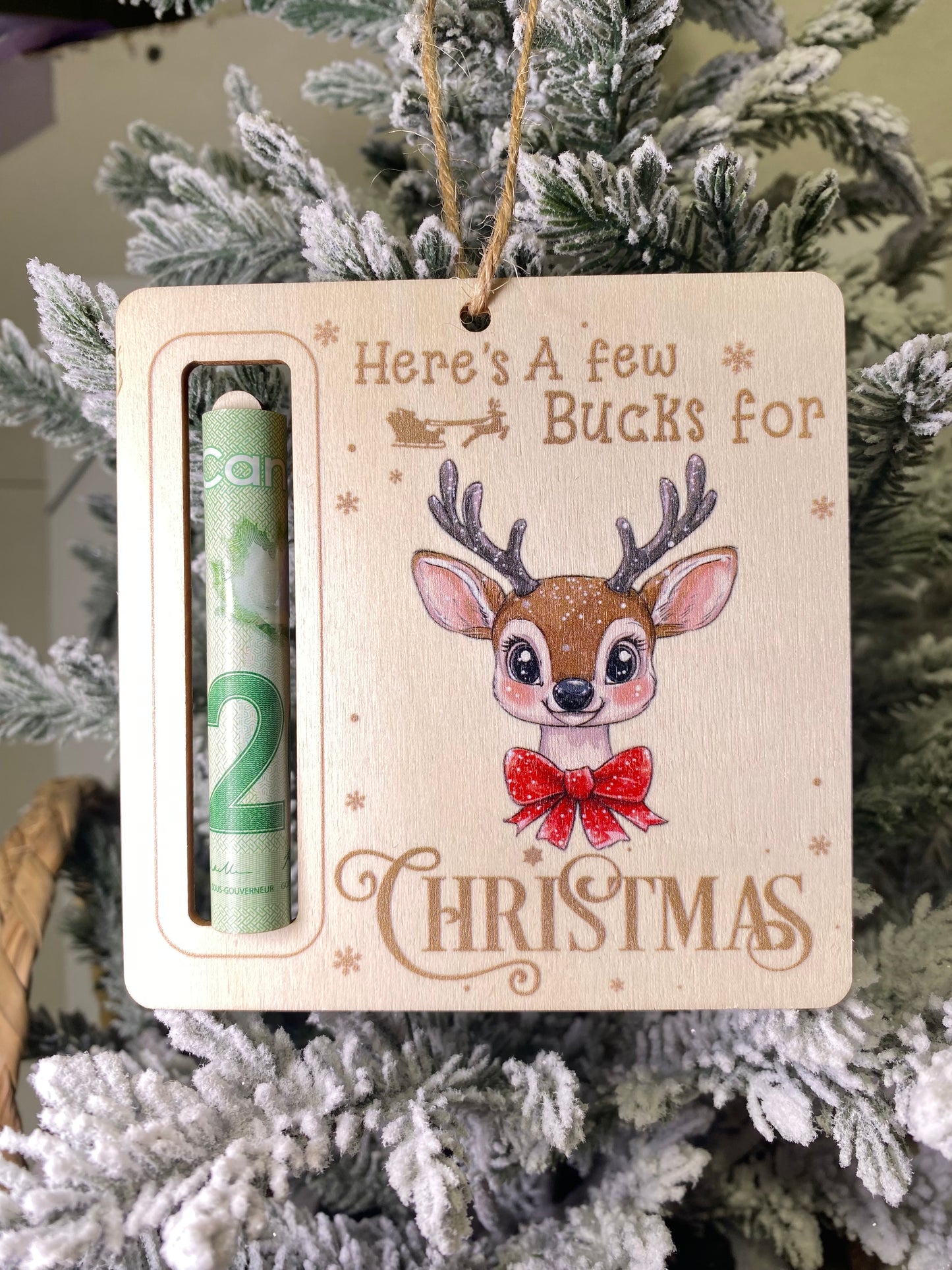 Here’s a few bucks wooden Christmas money ornament