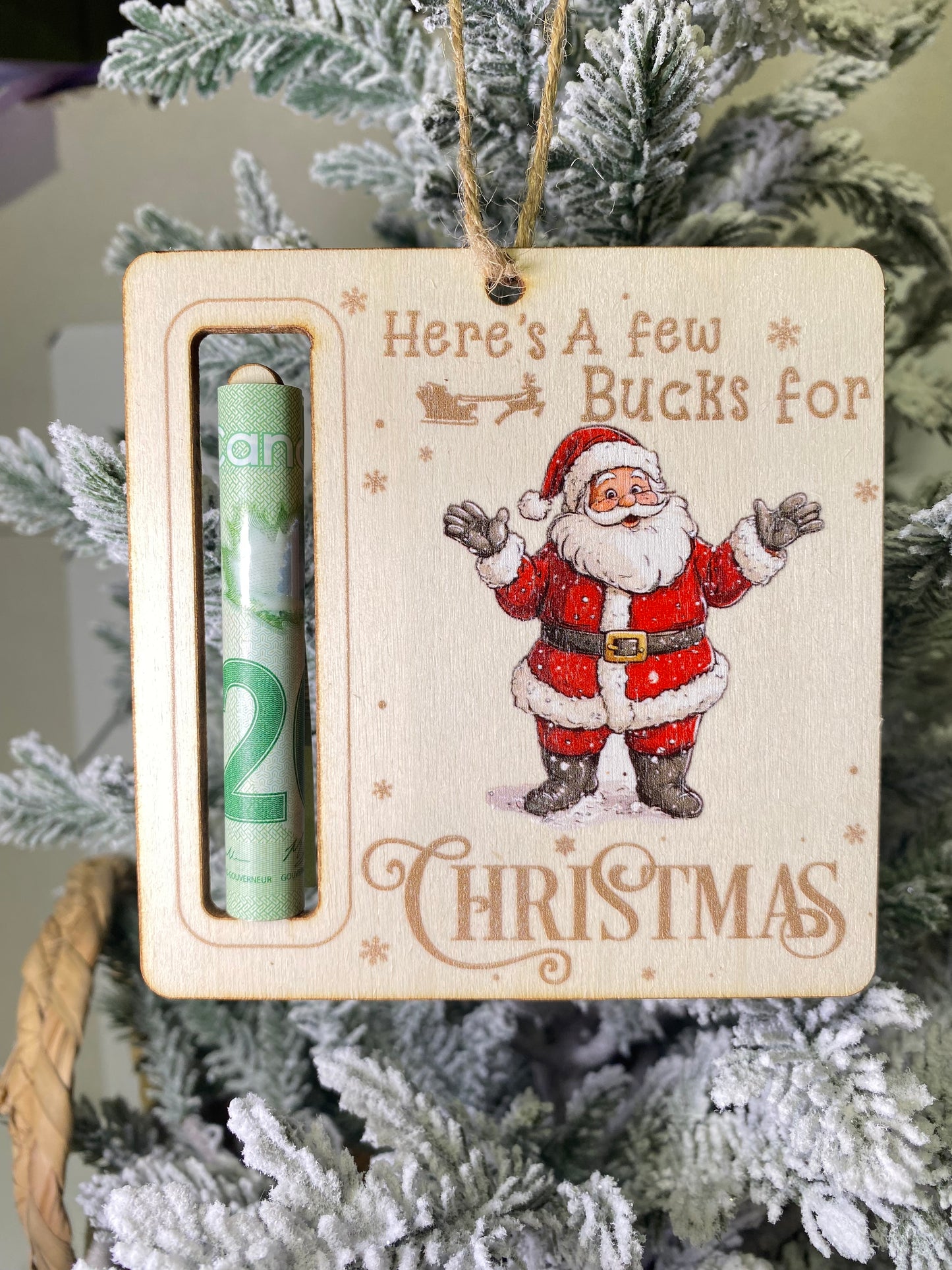 Here’s a few bucks wooden Christmas money ornament