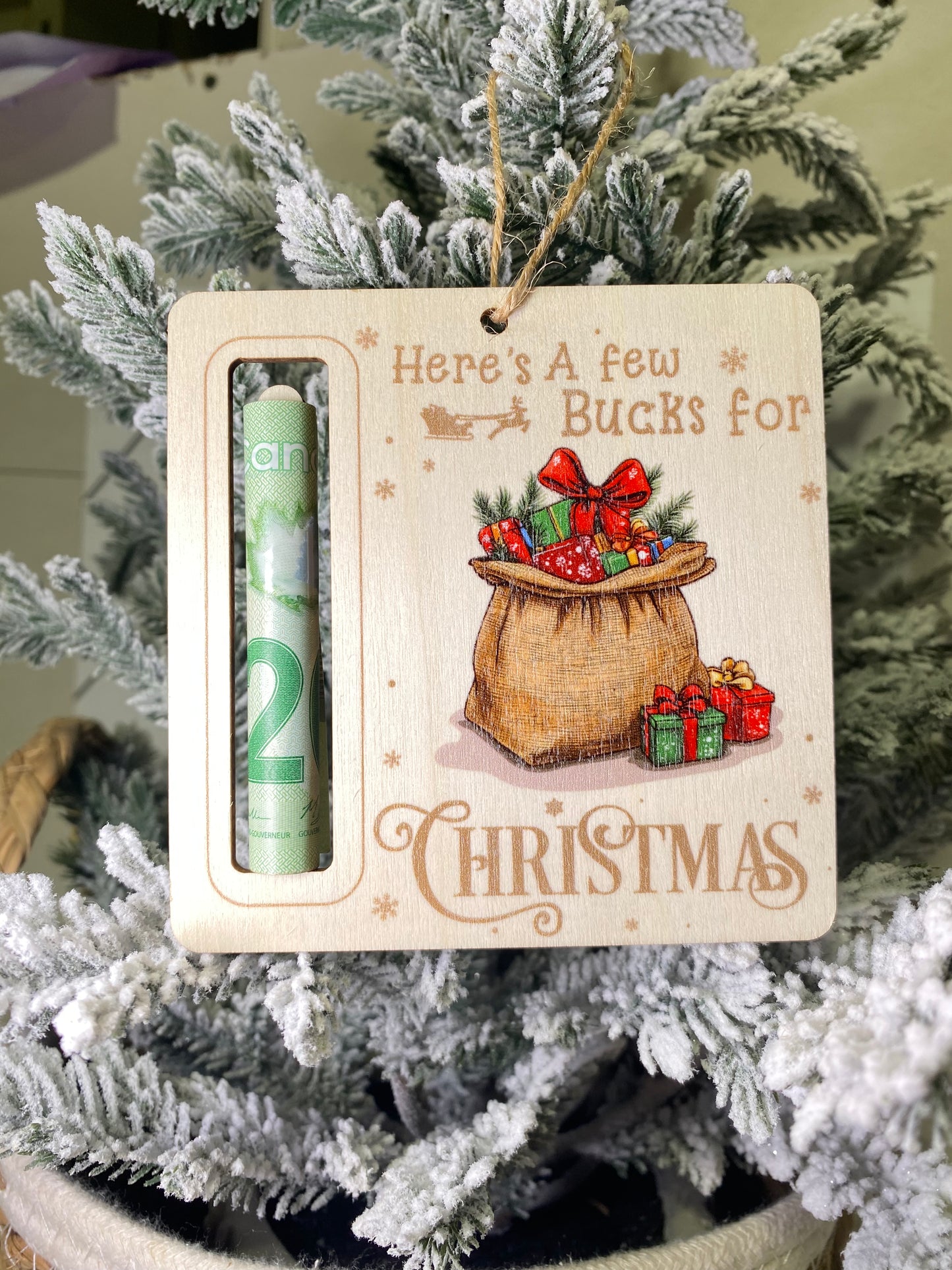 Here’s a few bucks wooden Christmas money ornament