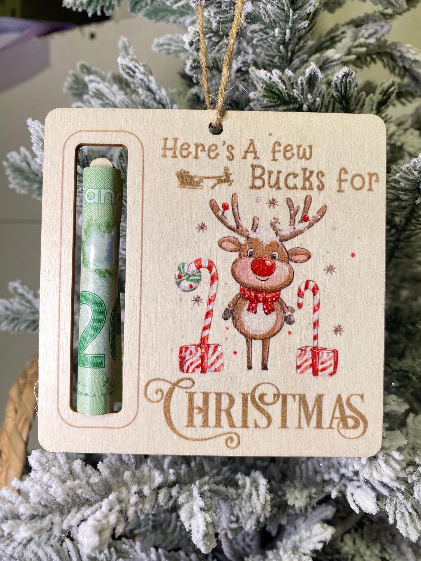 Here’s a few bucks wooden Christmas money ornament