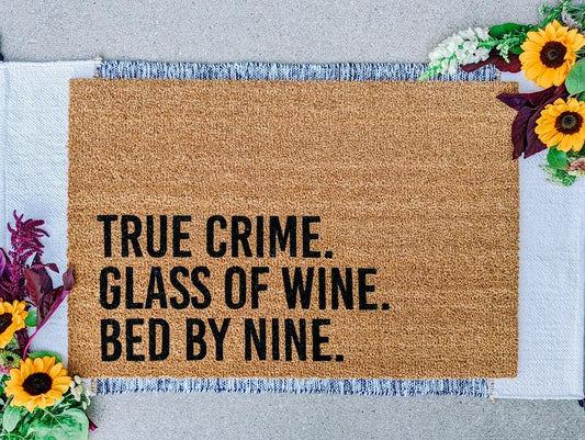 True crime glass of wine bed by nine doormat