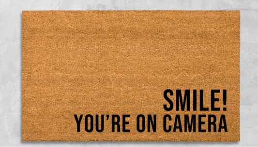 Smile you’re on camera doormat